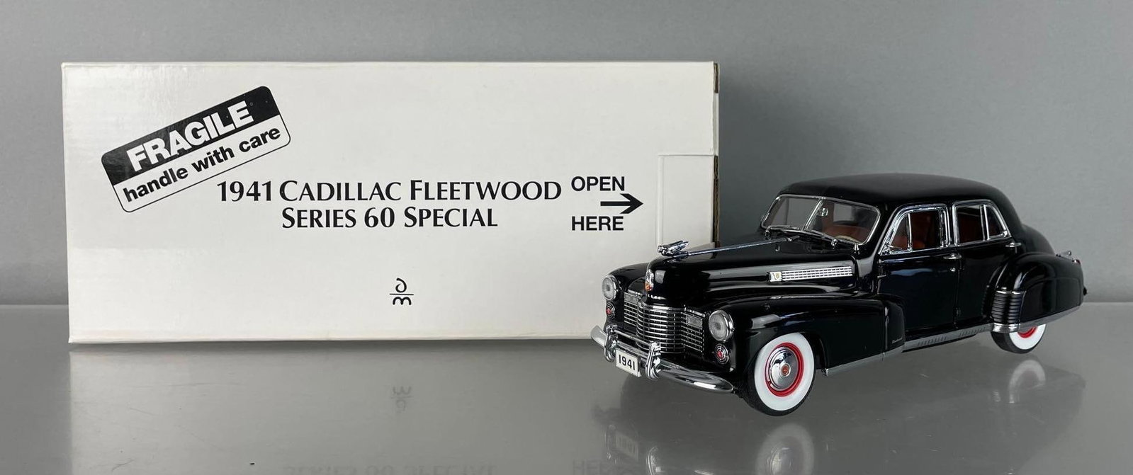 Danbury Mint 1941 Cadillac Fleetwood Series 60 Special Die-Cast Car: 1/24 scale, black, original packaging