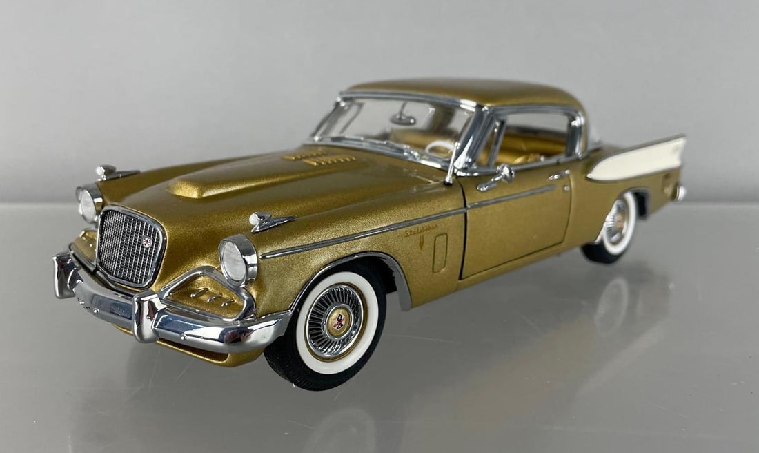 Danbury Mint 1957 Studebaker Golden Hawk Die-Cast Car: 1/24 scale, gold / white