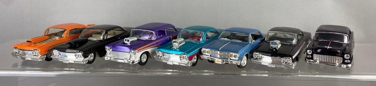 Group of Assorted Racing Champions 1:24 Scale Die Cast Vehicles: Stand not included.