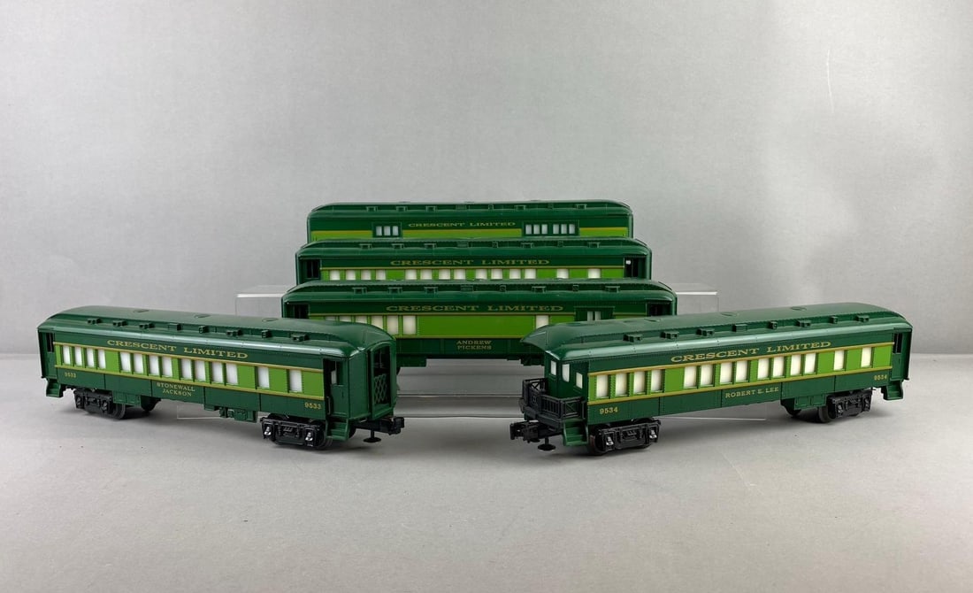 Group of 5 Lionel Trains O Gauge Crescent Limited Passenger Cars: lighted Interior. Untested. One measures H 3 x W 2 1/2 x L 12 inches.