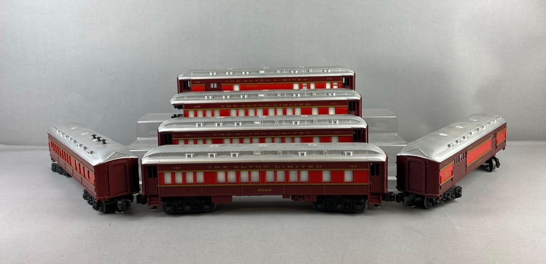 Group of 6 Lionel Trains O Gauge Alton Limited Passenger Cars: Untested. Lighted interior. One measures H 3 x W 2 1/2 x L 13 inches. Stand not included.