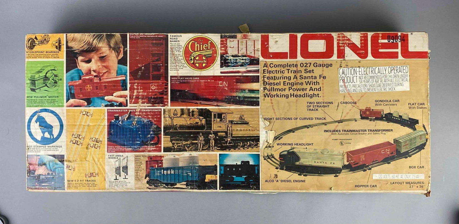 Lionel Trains O27 Gauge Santa Fe Train Set: Missing transformer. Packaging has rips and tears throughout. Measures H 3 1/2 x W 12 x L 30 inches.