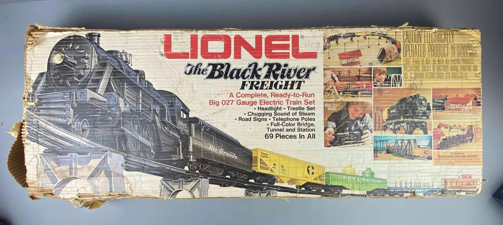 1980 Lionel Trains O27 Gauge The Black River Freight Train Set: Incomplete set. Box is heavily damaged. Untested. Package measures H 3 1/2 x W 13 x L 36 inches.