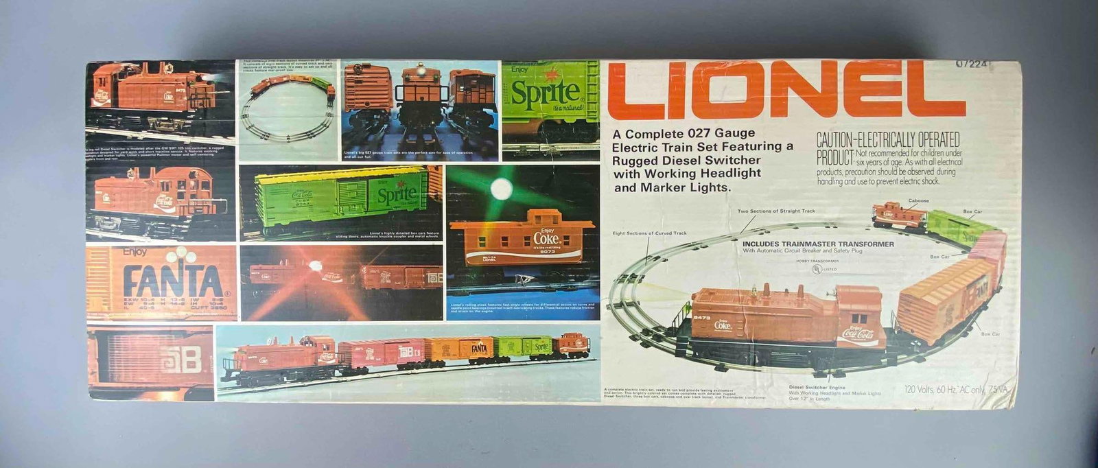 1980 Lionel Trains O27 Gauge Soda Advertising Train Set: Sealed. Like new in original packaging. Measures H 3 1/2 x W 12 x L 32 inches.