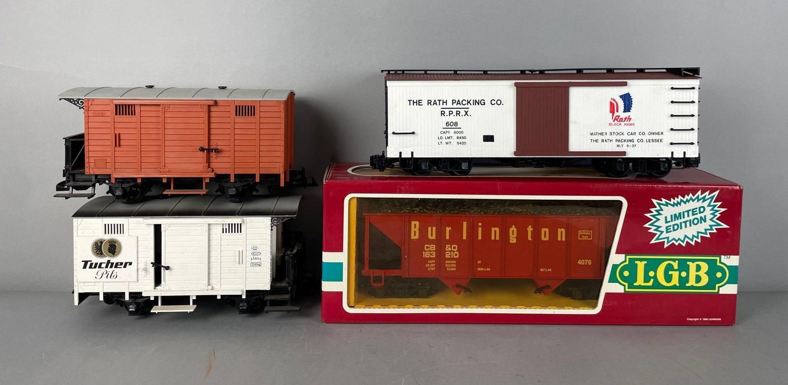 Group of LGB G Scale Train Cars: Includes Burlington coal car, Tucker Pils refrigerator car