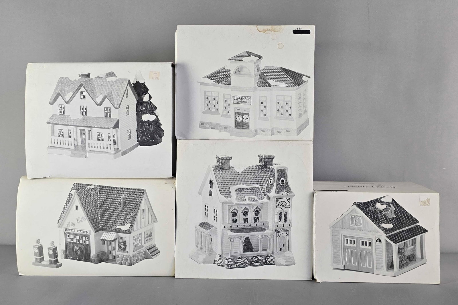 Group or 5 Department 56 Christmas Snow Village Buildings: Includes Jefferson School, Big Bills Service Station, Single car garage and more, in original boxes. Largest measures 10" H x 10" W x 8" D