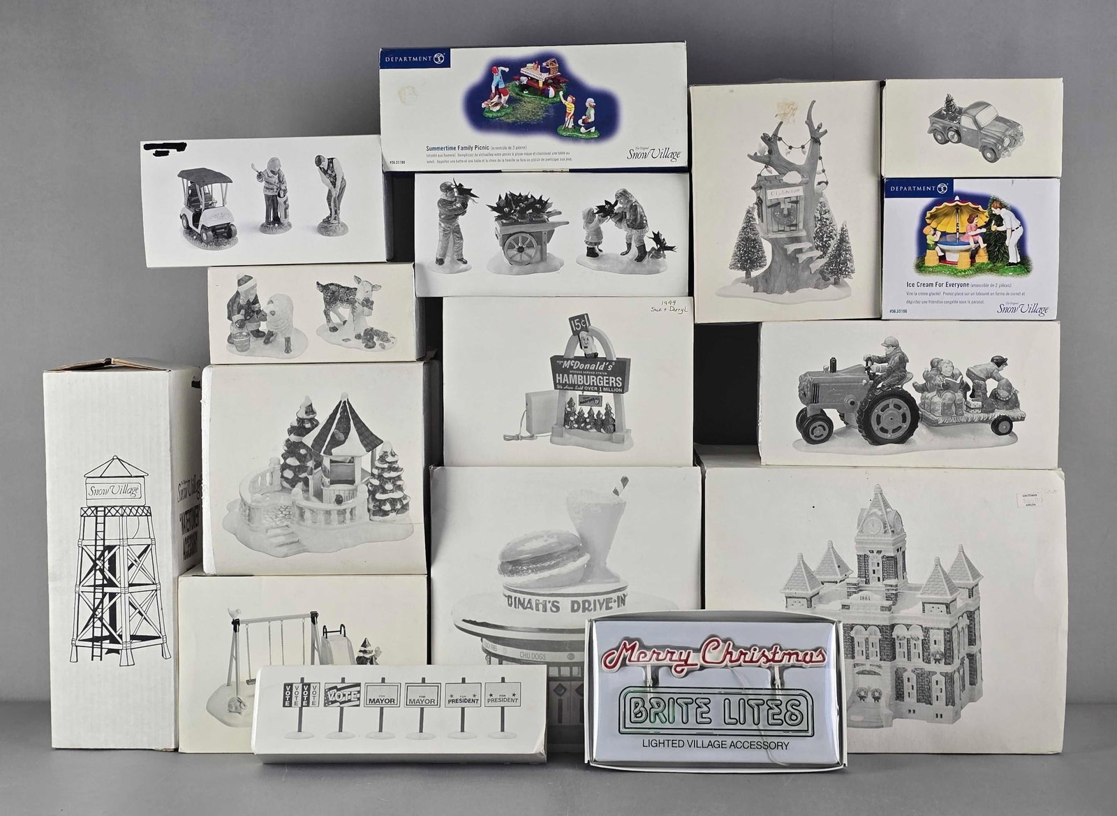 Group of Department 56 Snow Village Buildings: In original boxes, includes ice cream for everyone, Dinahs drive in, summertime family picnic and more, largest measures 10" H x 12" W x 8" D