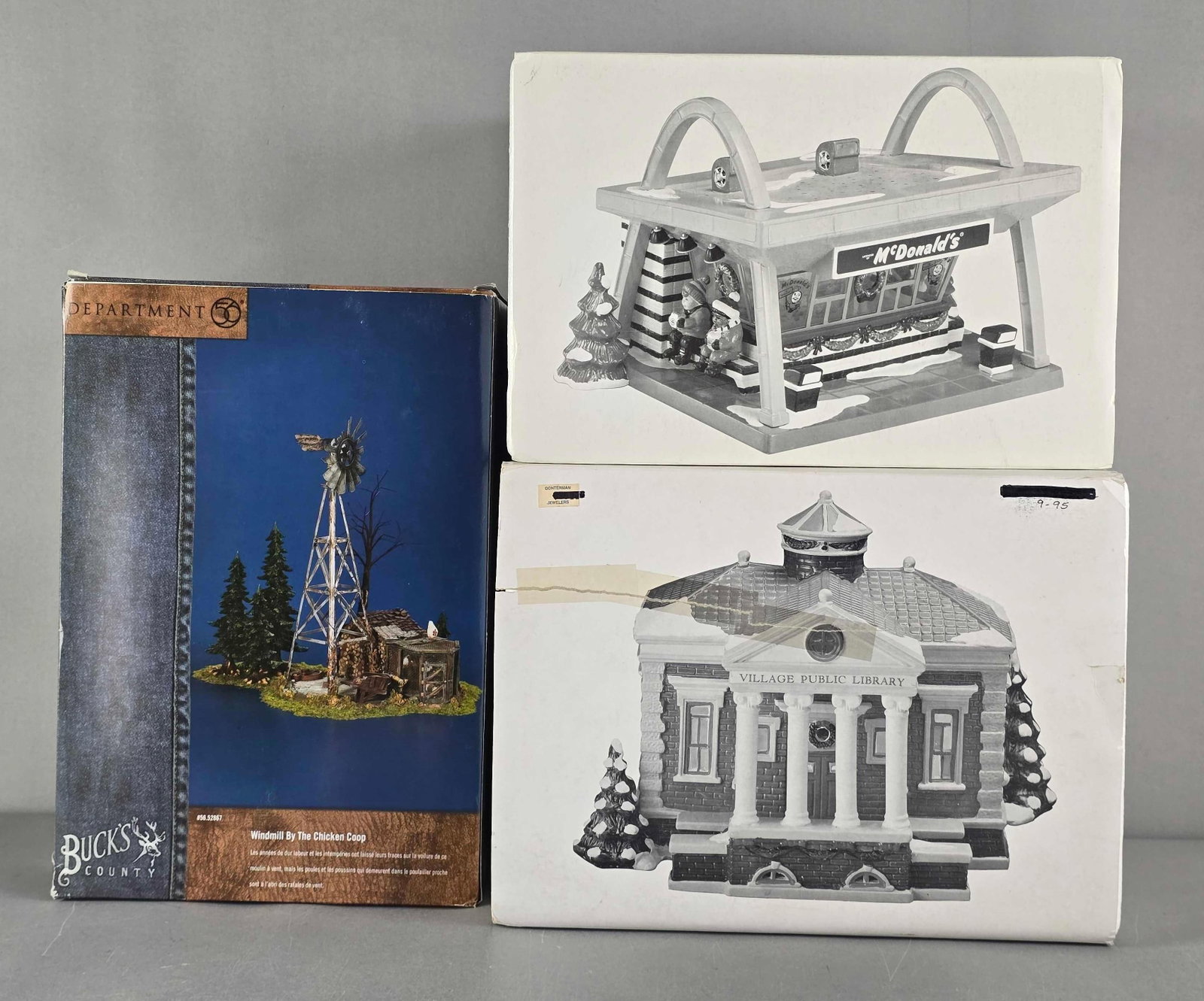 Group of Department 56 Building's: 2 Snow Village and 1 bucks county, includes village public library, McDonalds and windmill by the chicken coop, in original boxes, largest box measures