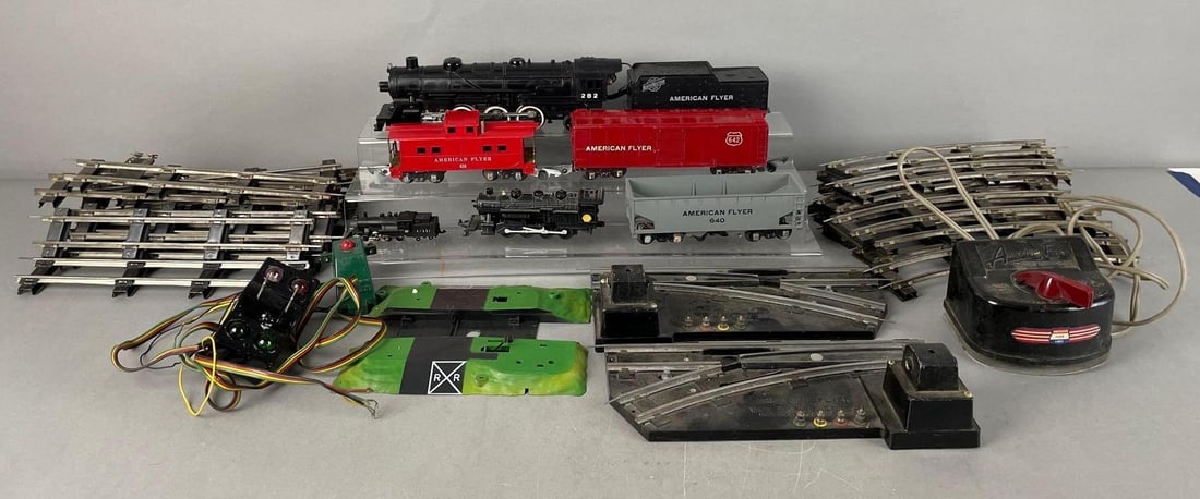 Group of American Flyer O Scale Trains and Accessories: Includes cnw 282 locomotive and tender, transformer, tracks and more, untested