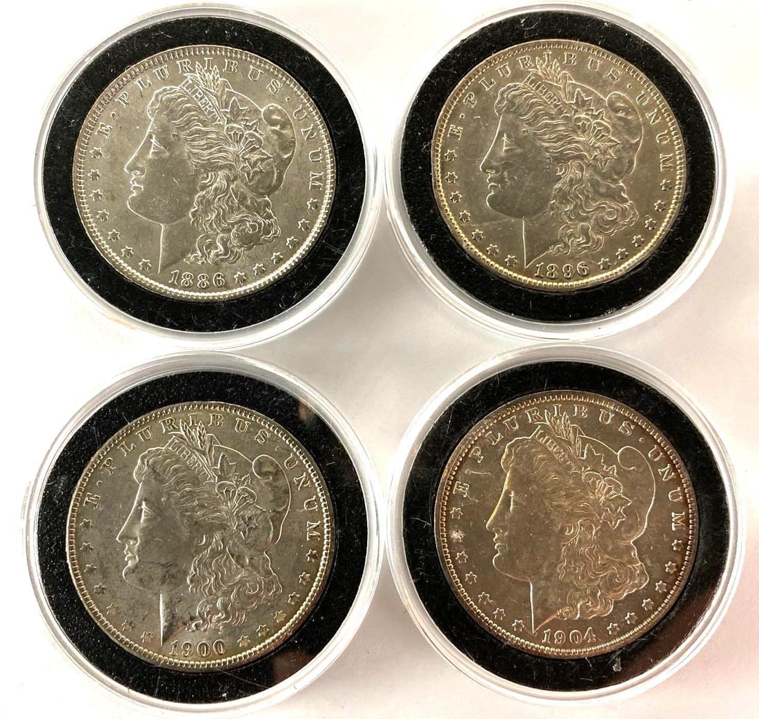Group of (4) US Morgan Silver Dollars: Includes 1886, 1896, 1900 and 1904-O.