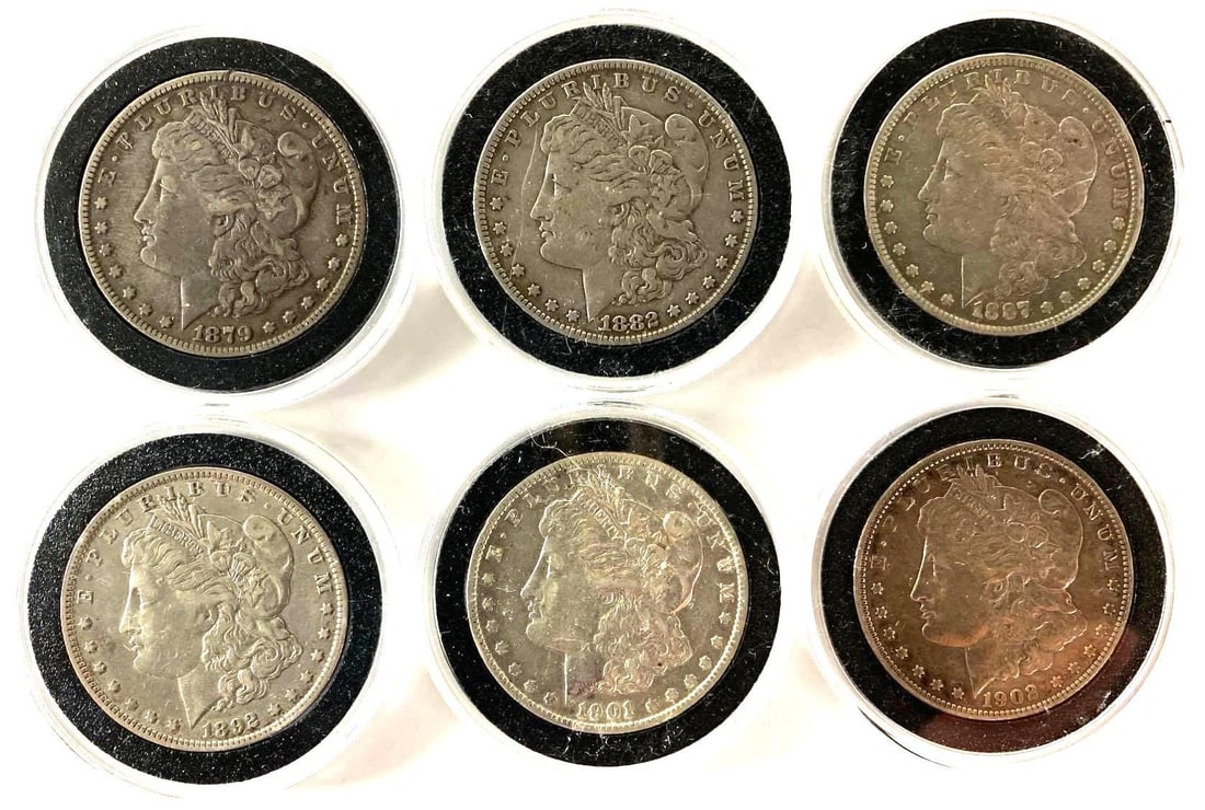 Group of (6) US Morgan Silver Dollars: 1879, 1882, 1887-S,1892-O, 1901-O and 1902-O.