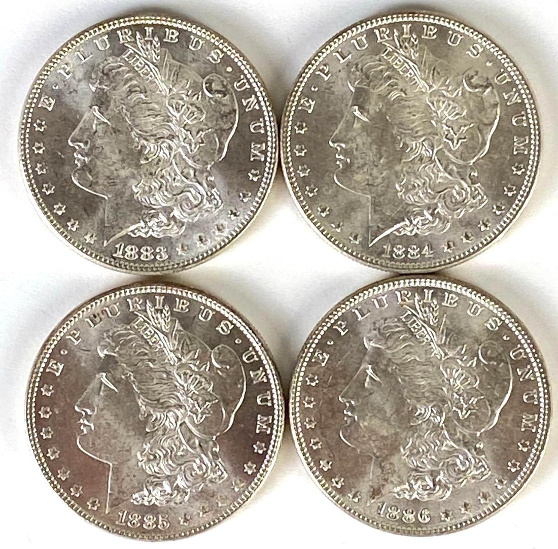 Group of (4) 1883-1886 US Morgan Silver Dollars: Includes 1883, 1884, 1885, and 1886.