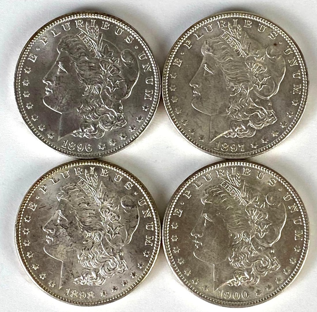 Group of (4) US Morgan Silver Dollars: Includes 1896, 1897, 1898, and 1900.