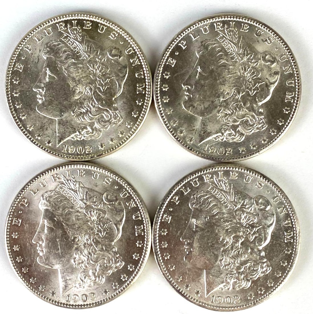 Group of (4) 1902-O US Morgan Silver Dollars: Group of (4) 1902-O US Morgan Silver Dollars