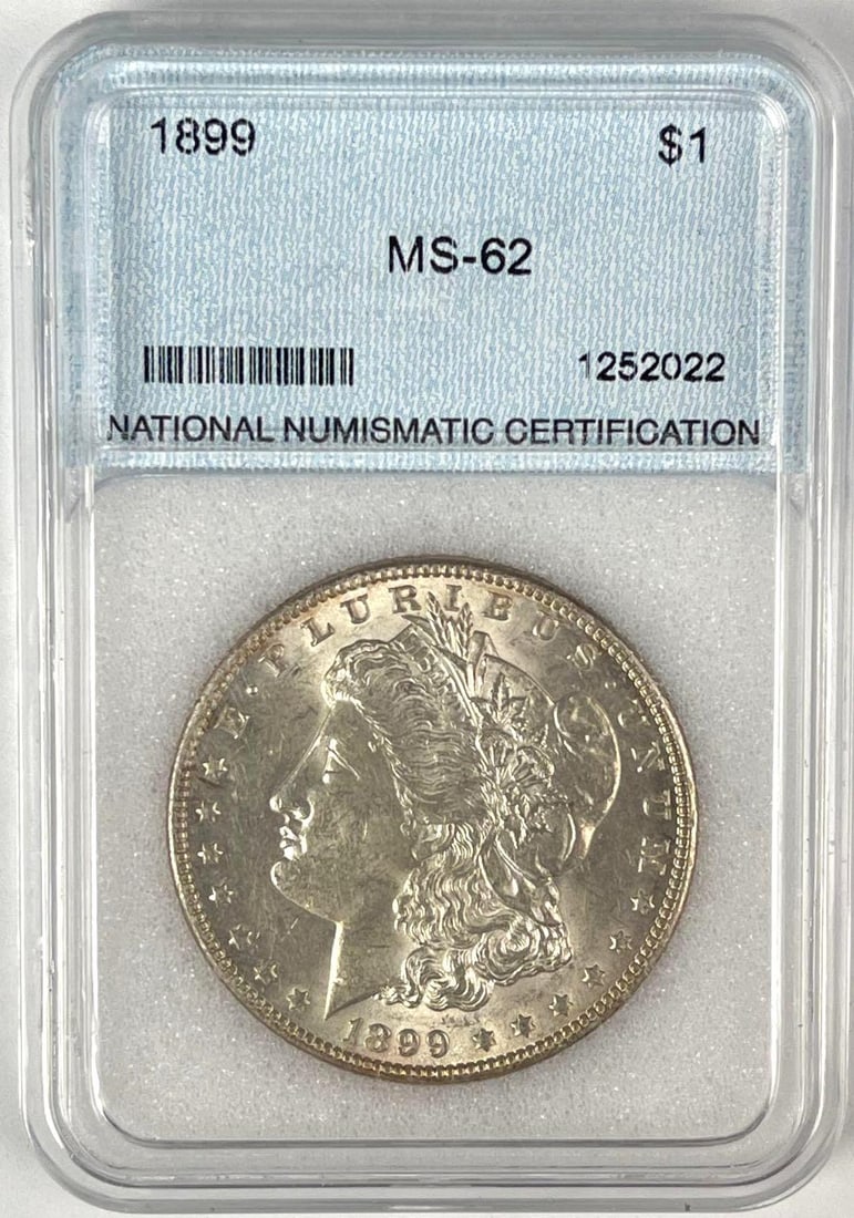 1899 US Morgan Silver Dollar NNC MS62: 1899 US Morgan Silver Dollar NNC MS62