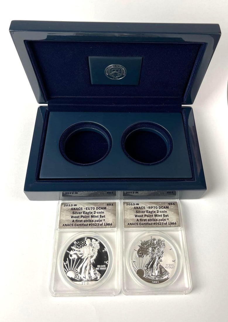 2013 W US Mint American Silver Eagle West Point 1 oz Fine Silver ANACS Graded Two Coin Set: Features EU70 DCAM and RP70 DCAM. Both are West Pint Mint, A First Strike Coin. Includes COA