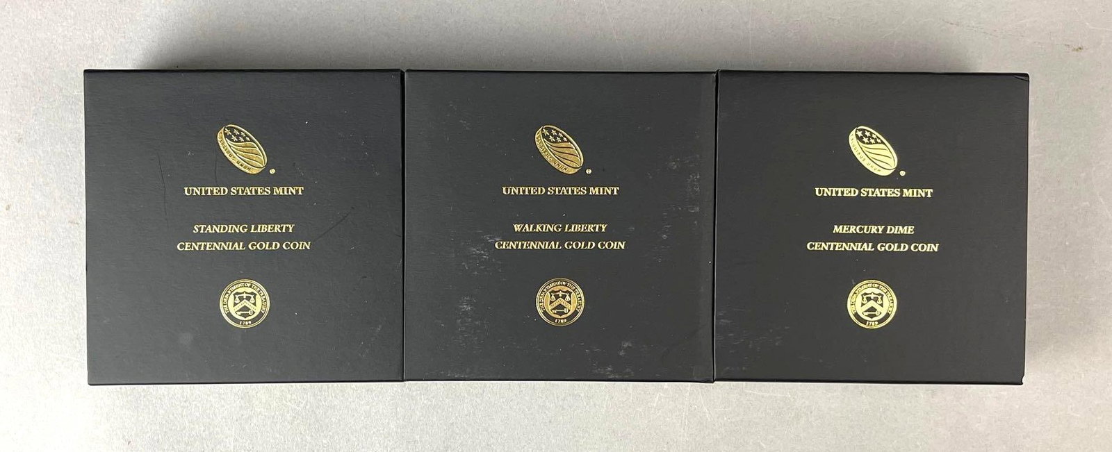 Group of 3 US Mint 2016 W 100th Anniversary .9999 Fine Gold Coins PCGS SP70: First Strike, First Day of Issue, 100th Anniversary. Includes Mercury Dime 1/10 oz, Standing Liberty 1/4th oz and Walking Liberty 1/2 oz. All include COAs.