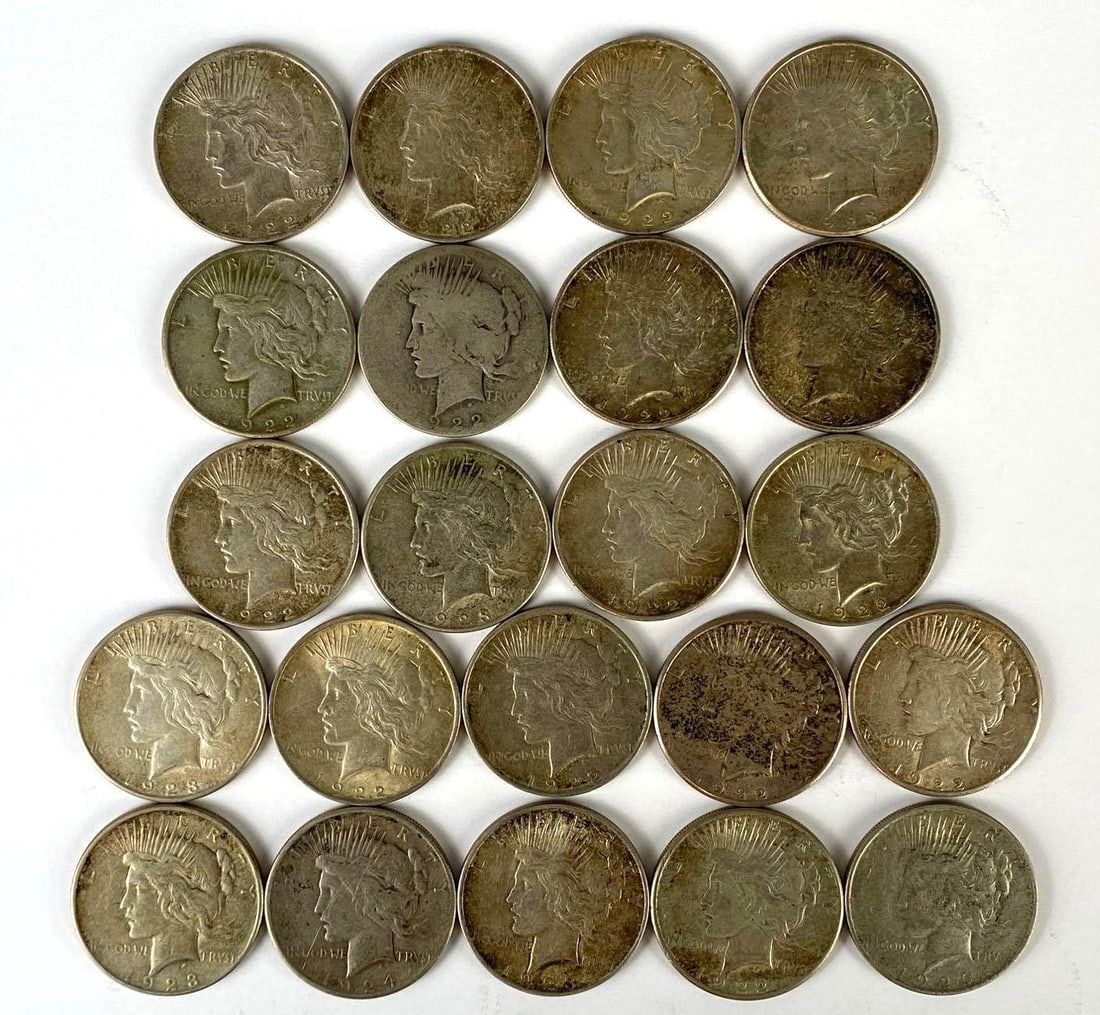 Group of 22 1920s US $1 Peace Silver Dollars: Includes 1922, 1922-S, 1923, 1926, and more.