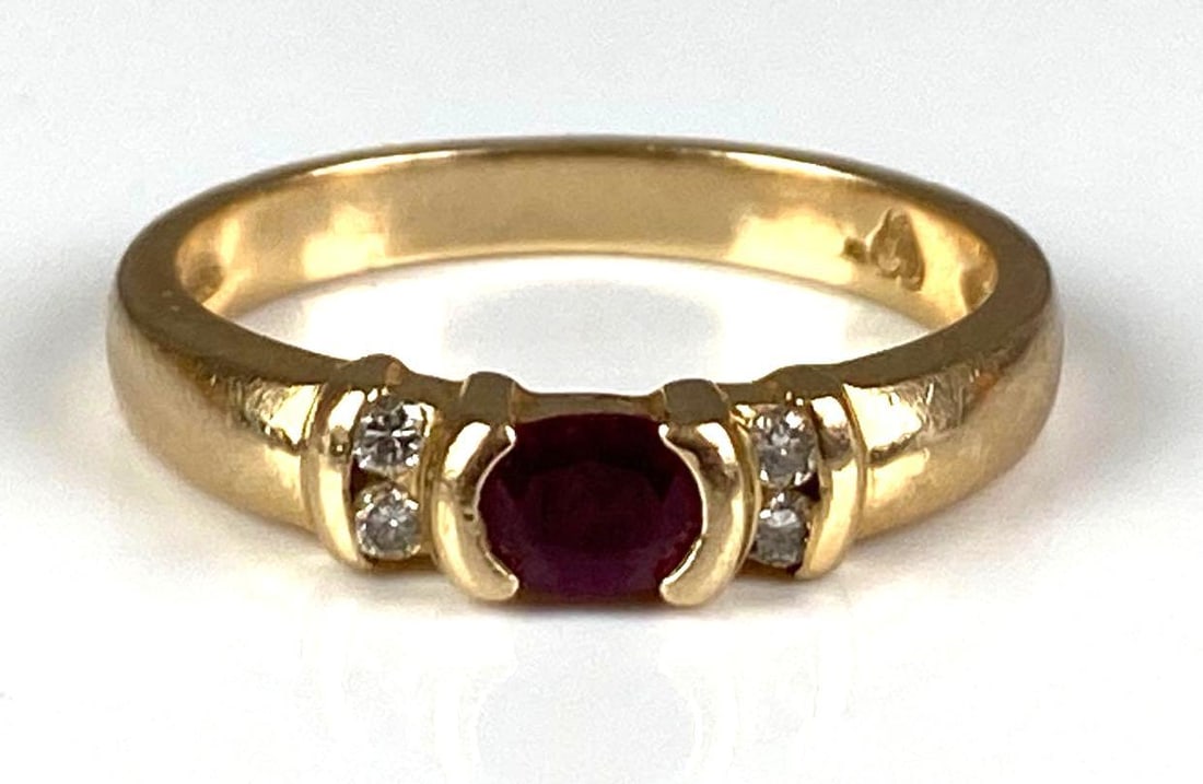 Signed 14K Yellow Gold Ruby Diamond Ring: total weight of 2.8 grams, size 6