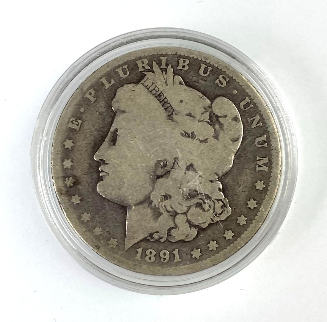 1891 CC US Morgan Silver Dollar: 1891 CC US Morgan Silver Dollar. Backside has been sanded off.