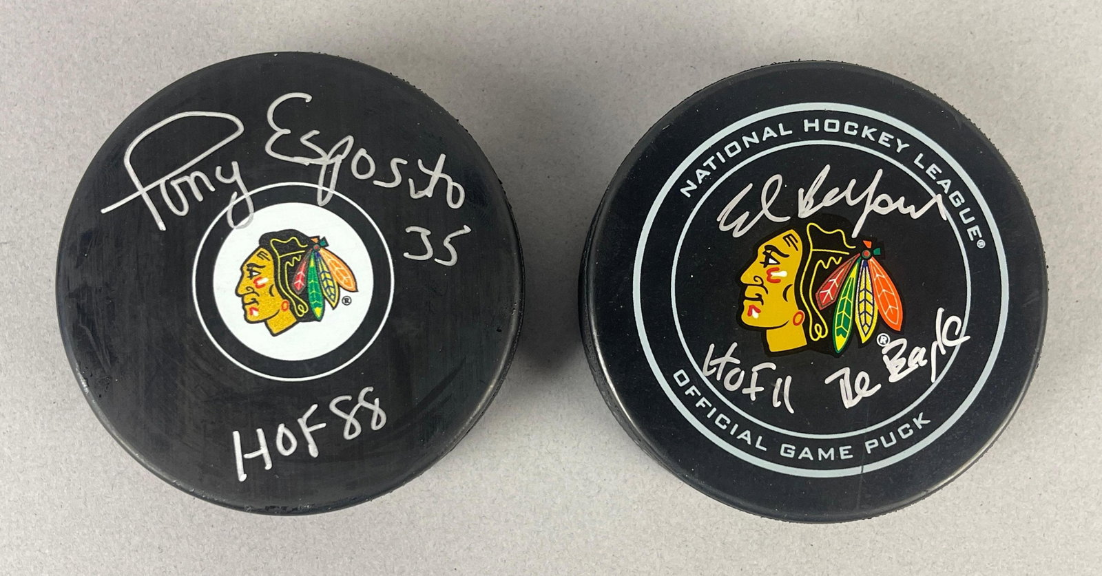 Ed Belfour and Tony Esposito Signed Hockey Pucks with PSA COAS (1 of 2)