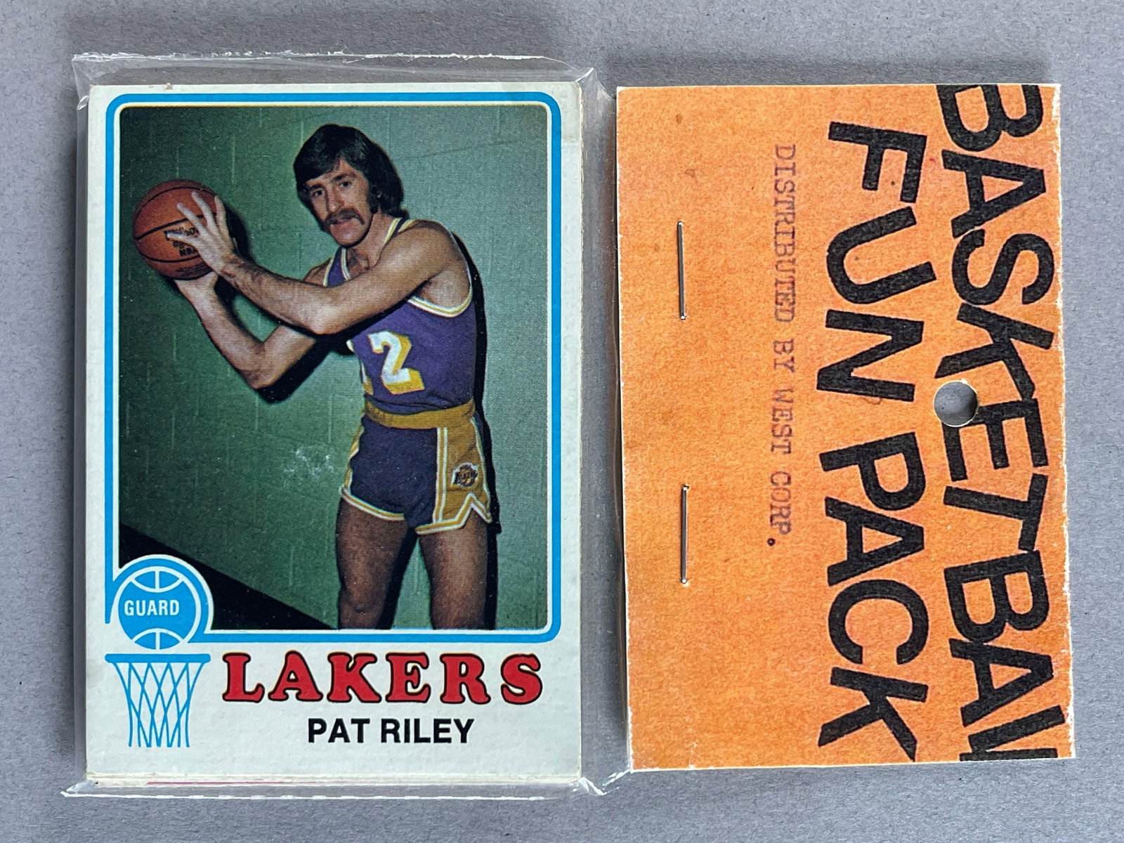 1973 Topps Basketball West Corps Cello Fun Pack with Pat Riley on Top and Billy Cunningham: 10 - Cards per pack, West Corp was a repacking company in the 1970s