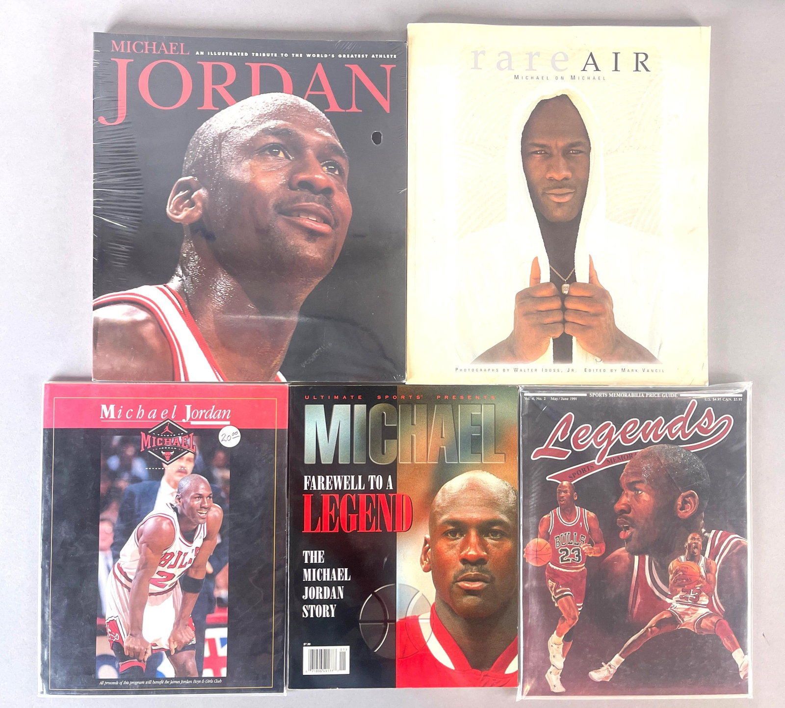 5 - Michael Jordan Books and Magazines: Rare Air, Sealed book, 1991 Legends Magazine with uncut cards, 1995 Farewell to a legend, 1994 A Salute to Michael