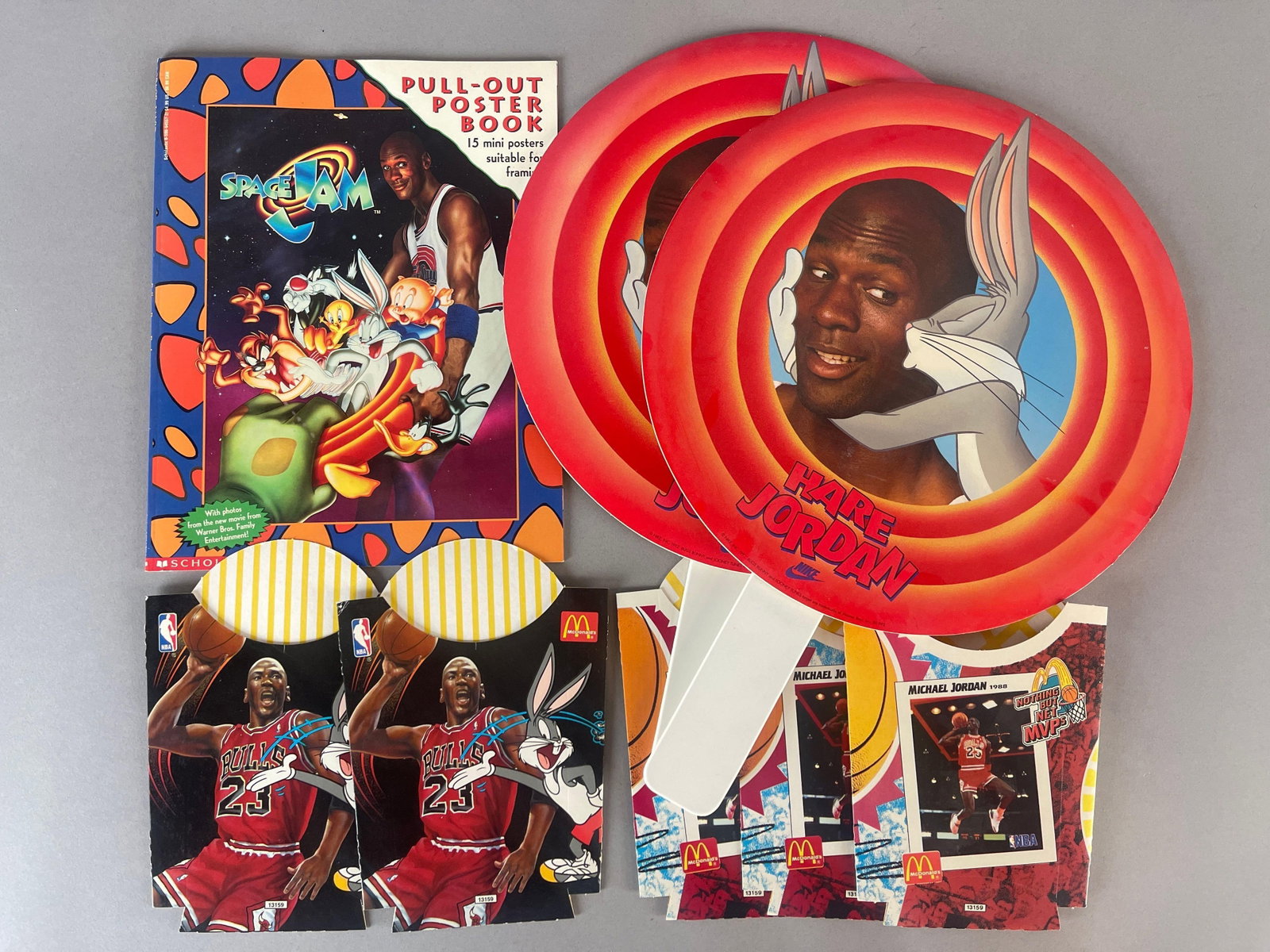 Michael Jordan Nike, Space Jam, and McDonalds Memorabilia: 2 - 1992 Nike Hare Jordan Fans, Space Jam Scholastic Poster Book, 5 - Unused McDonalds fry boxes