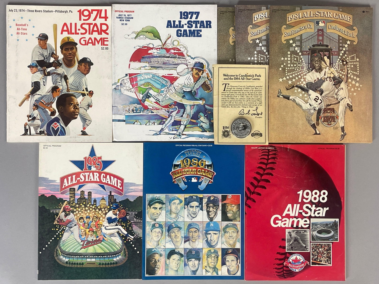 8 - 1974 - 88 Baseball All-Star Game Programs: In Great condition, 1974, 77, 3 - 84, 85, 86, and 88, 1988 has wrinkles, 1984 All-Star Pin included