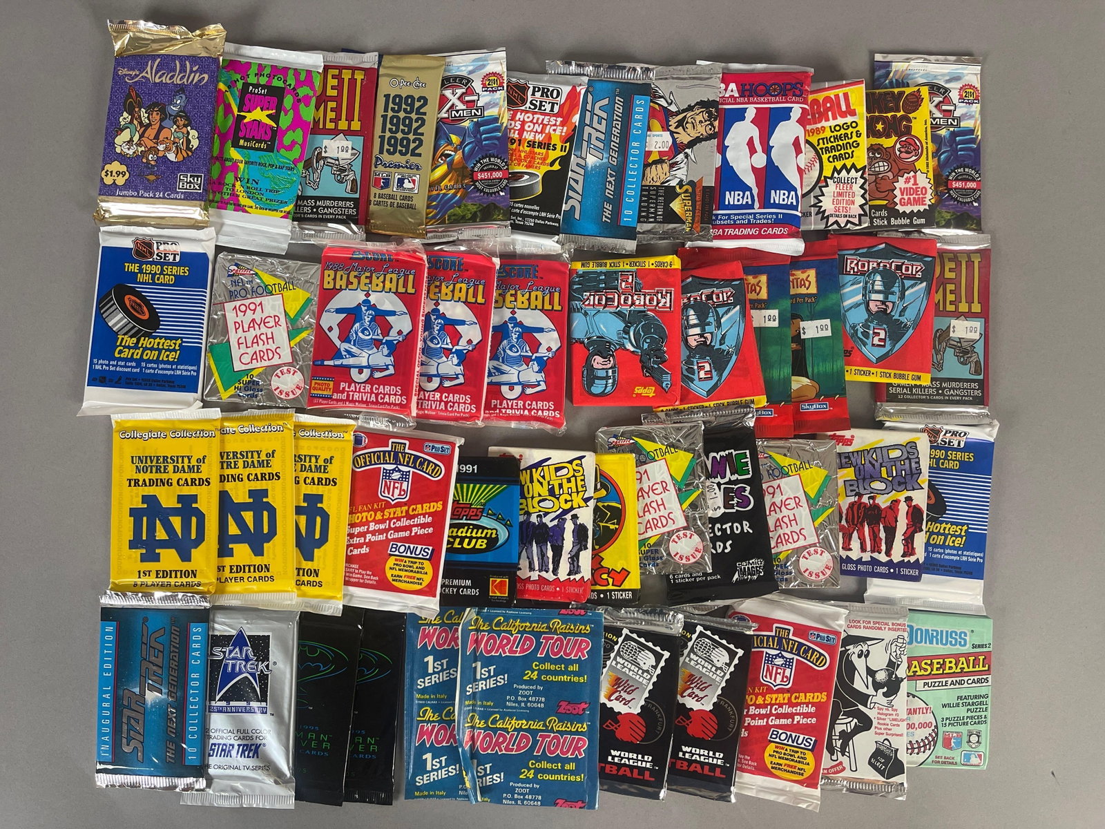 60 - 1980s - 90 Sports and Non Sports Unopened Packs: 1990 NBA Hoops, 1989 Fleer Baseball, 1982 Topps Donkey Kong, 2 - 1996 Fleer X-Men, and More