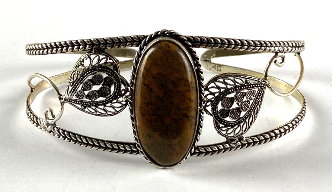 Silver Plated Costume Jewelry Bronzite Cuff Bracelet: Inner diameter measures 8 inches with a 1 inches opening