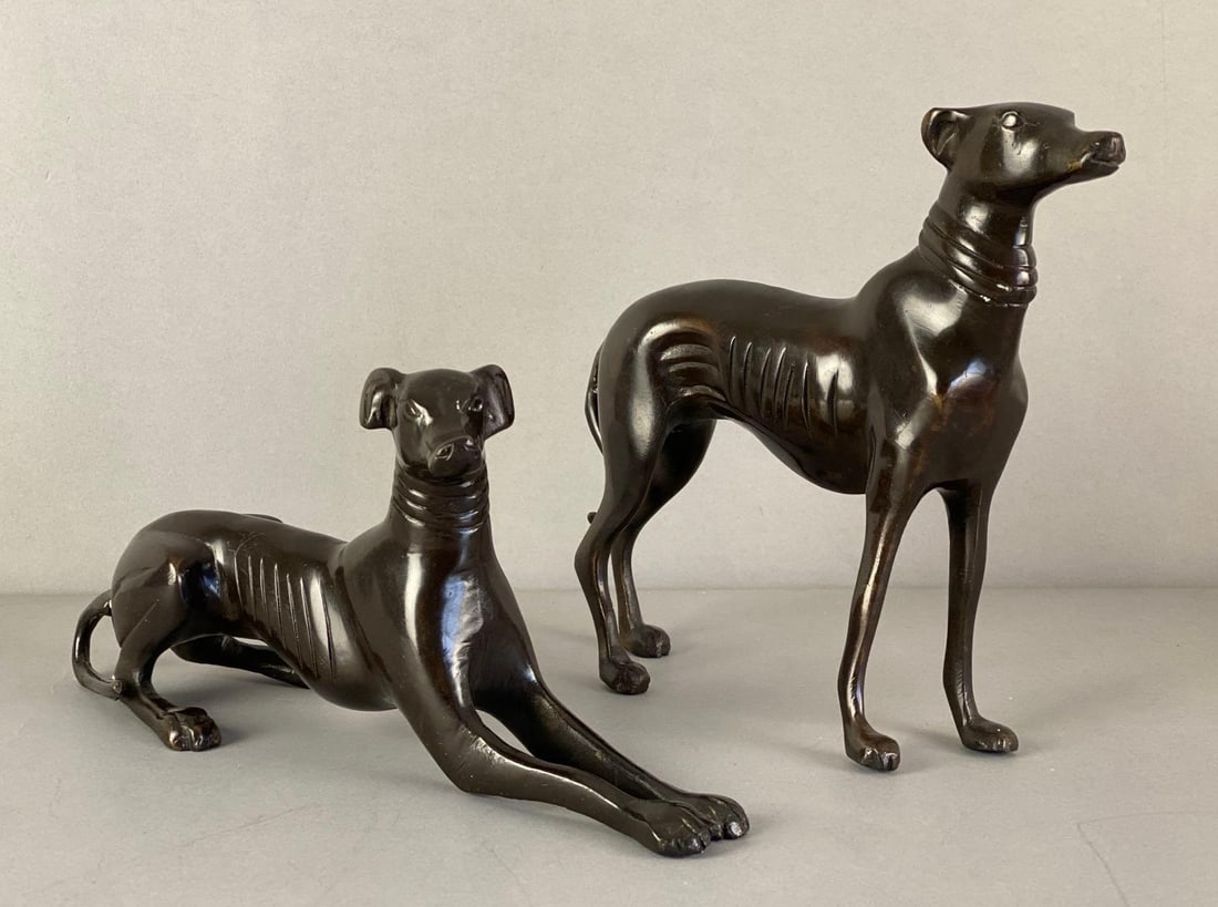 Group of 2 Cast Brass Dog Figurines: Largest measures 8 1/4 inches H x 2 inches W x 9 inches D