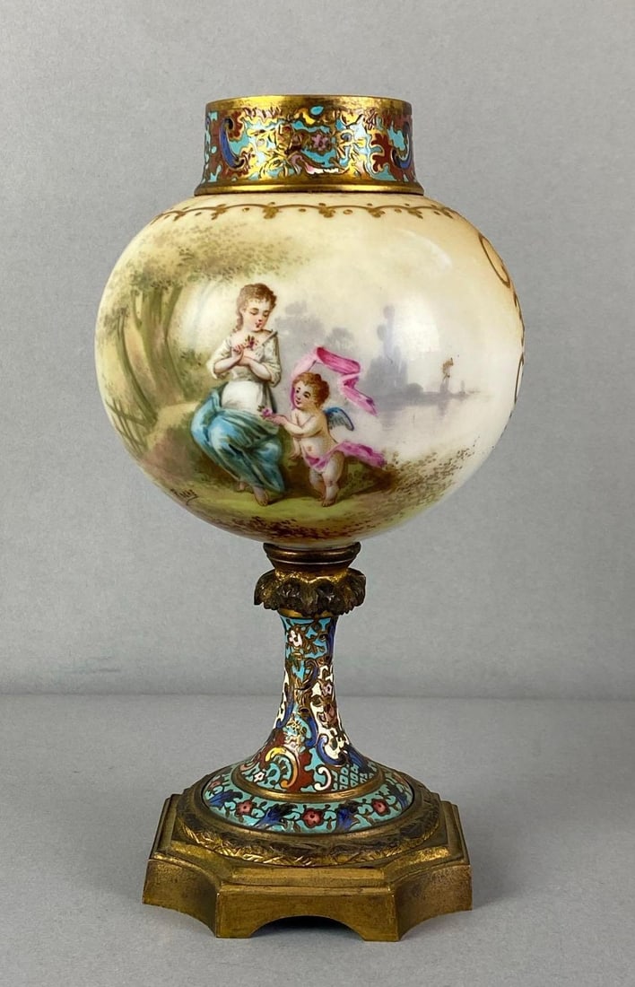 Antique Roche Signed Hand Painted Porcelain Brass Vase: Features pictorial Motifs and gilt brass hardware, Missing lid, Measures 8 inches H x 4 inches W x 4 inches D