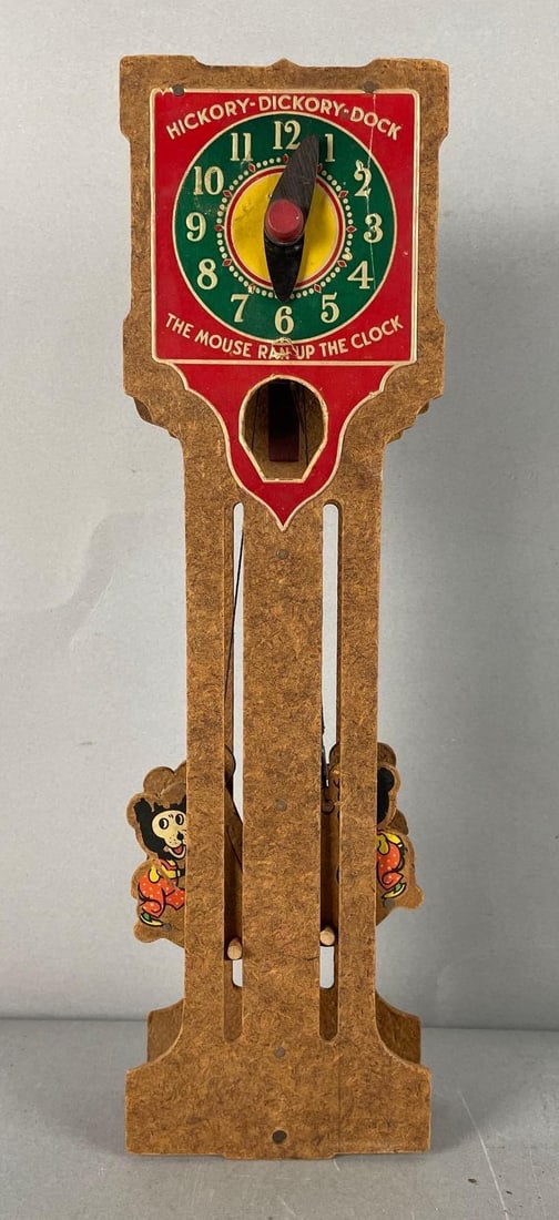 Vintage Noma Hickory Dickory Dock Toy Clock: Pressboard, working condition, measures 14" x 4" x 1 3/4"