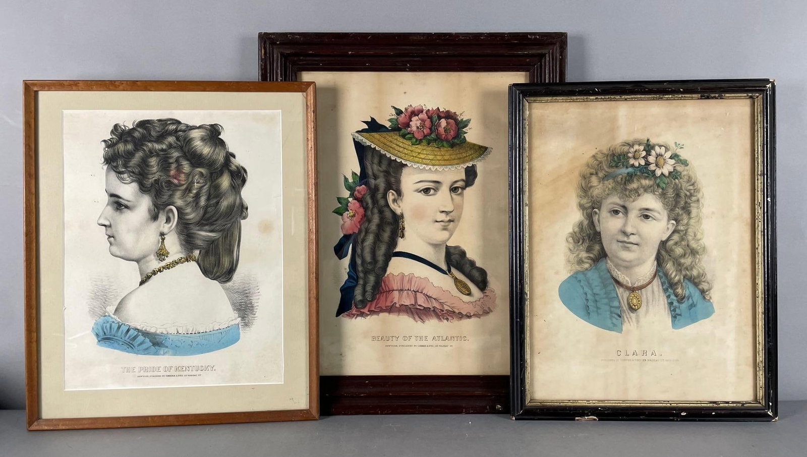 Group of 3 Antique Currier and Ives Female Portrait Lithographs: Includes the pride of Kentucky, Clara, beauty of the Atlantic, largest frame measures 20 1/4" x 16 1/2"