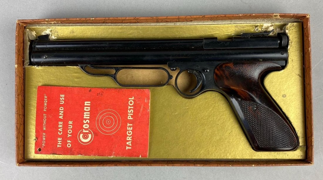 1940s Crosman .22 Cal Pump Action Target Pellet Pistol: Like new in original packaging. Non working. Seals need replacement. Measure H 1 x W 6 1/2 x L 13 inches.