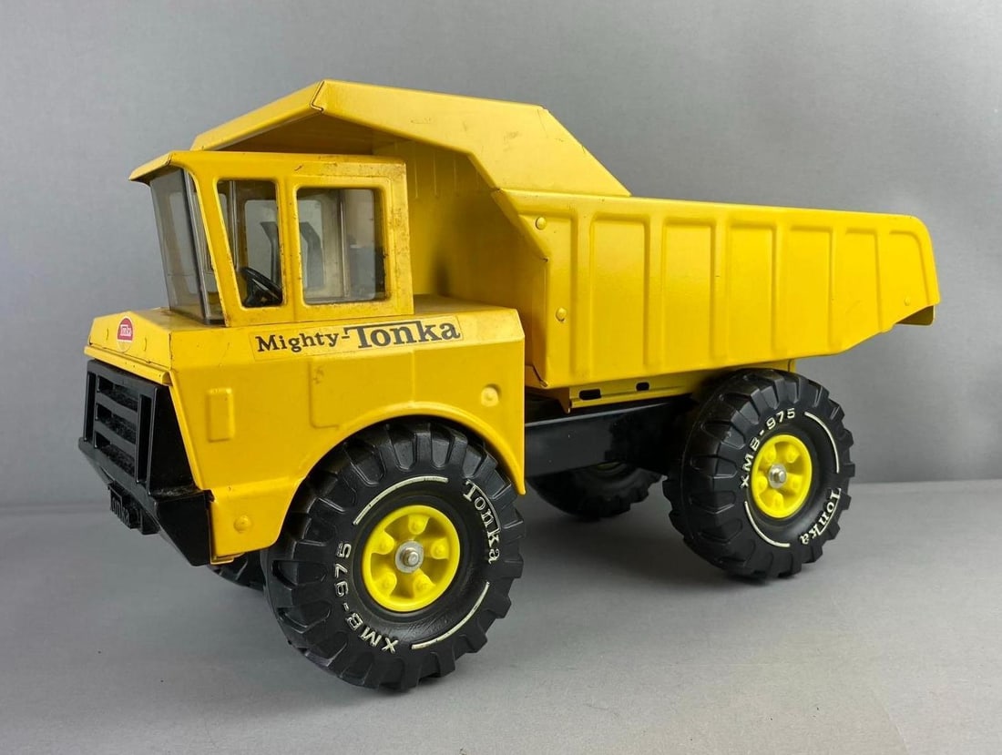 1970s Mighty Tonka Dump Truck Pressed Steel Vehicle: Measure 20 inches in length.
