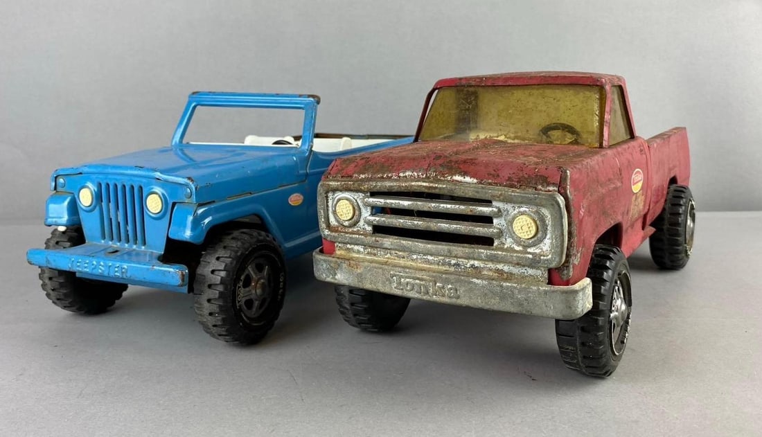 Group of 2 Tonka Truck Press Steel Vehicles: rust and paint chips throughout.largest measures H 6 x W 5 x L 14 inches.