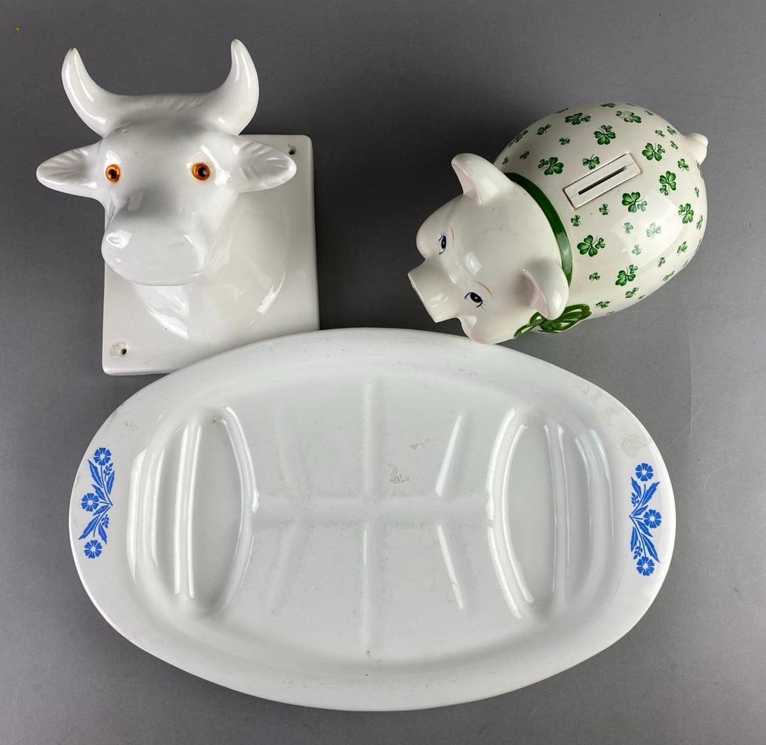 Group of Assorted Ceramic Items: Includes cow heads, piggy bank, and platter. Largest measures 16 1/2 inches.