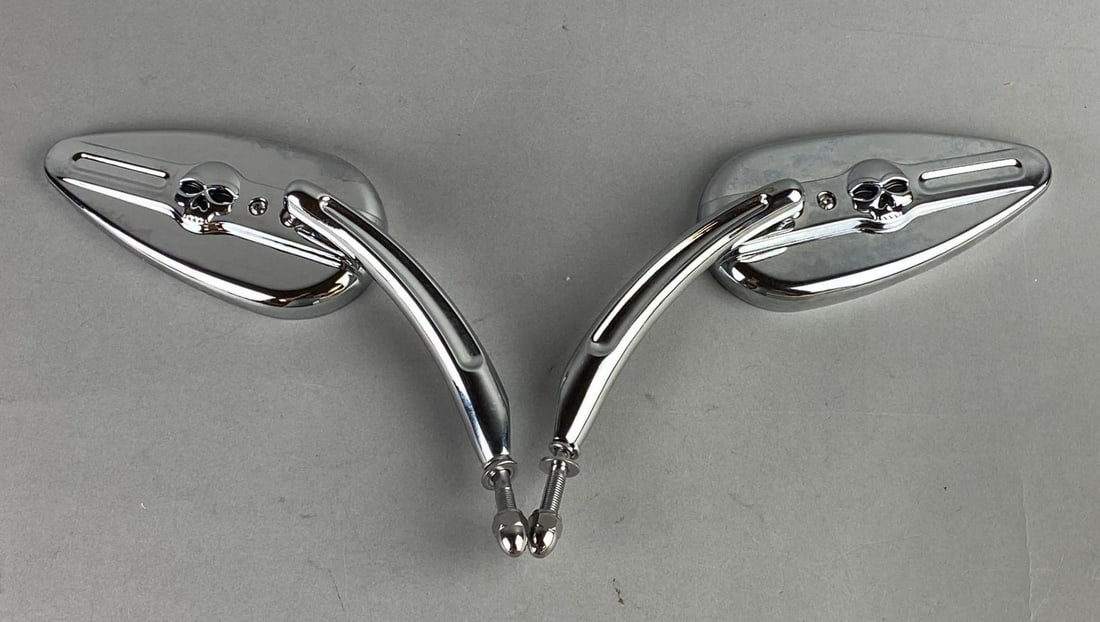 Kapsco Harley Davidson Skull Mirrors: Like new in original packaging. One measures 11 inches inches length.