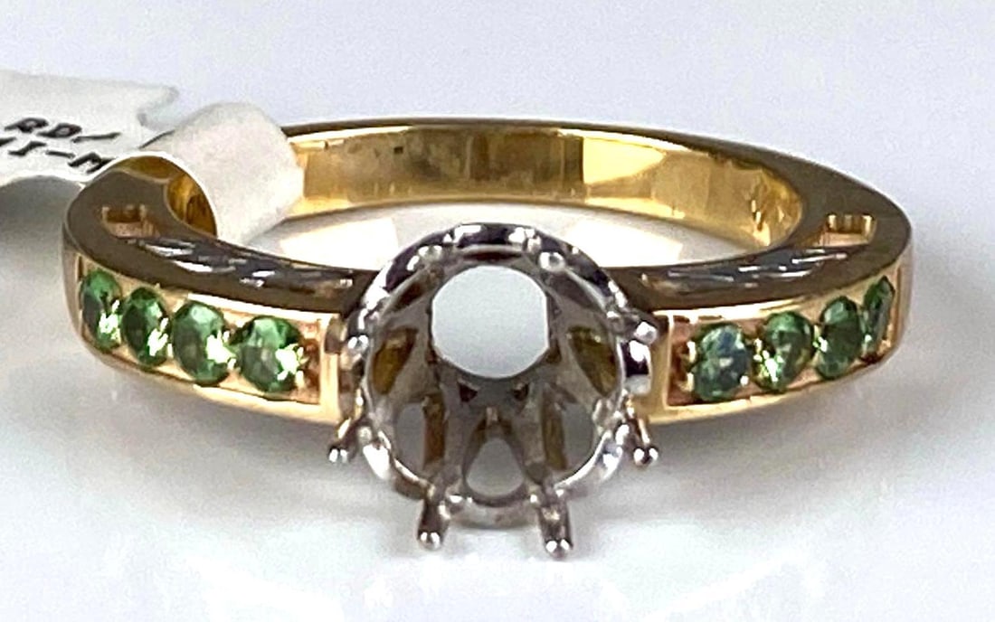 10K Yellow/White Gold Emerald Ring: Total weight of 3.8 grams, size, original tag, missing center stone
