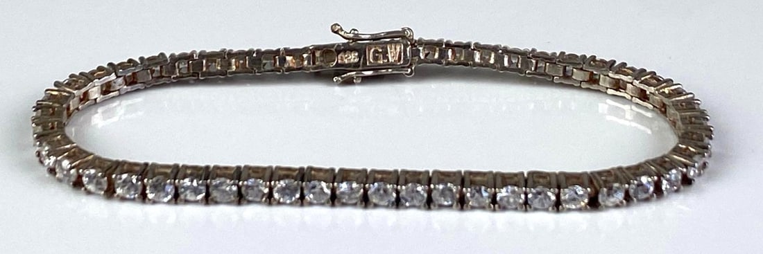 GW Signed Sterling Silver CZ Bracelet: Measures 7 inches in length
