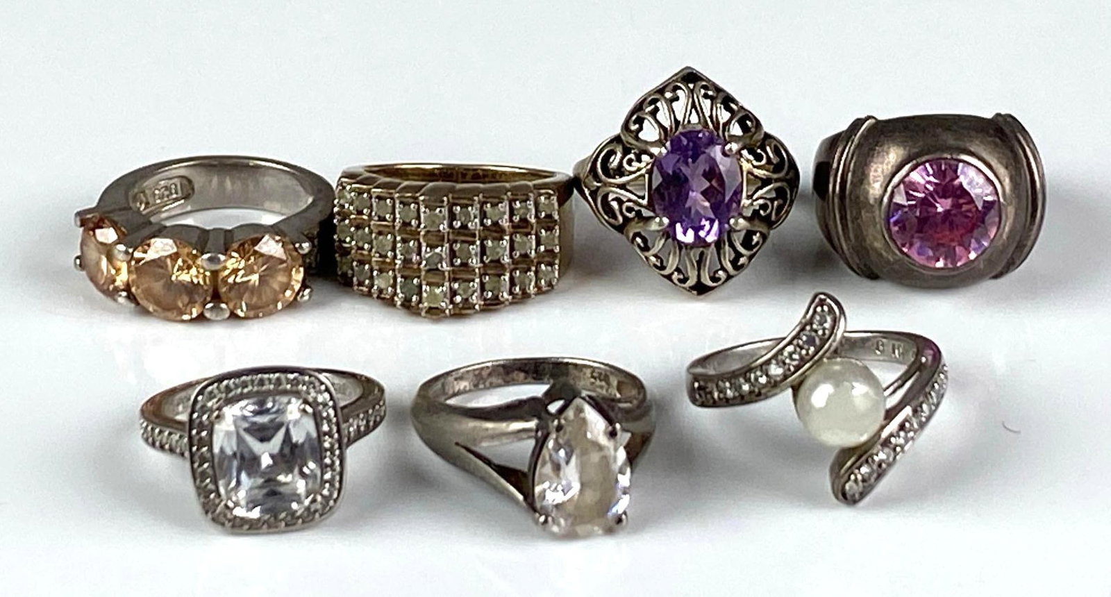 Group of 7 Sterling Silver Rings: sizes range from 6-8