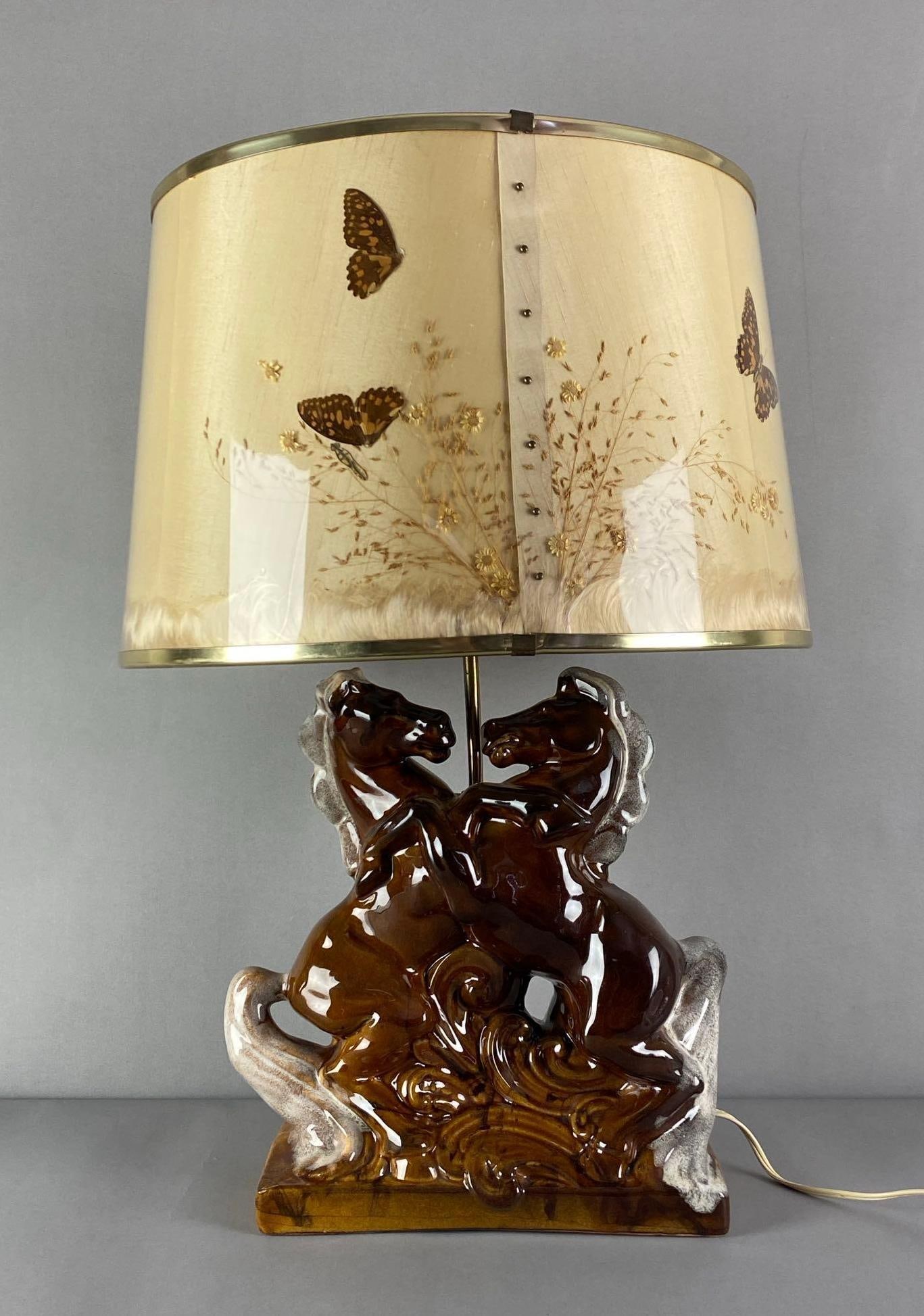 Van Briggle Pottery Figural Double Rearing Horse Table Lamp: In working condition, feature original butterfly shade, lamp rod loose from base, lamp measures 24 inches H x 16 inches W x 16 inches D