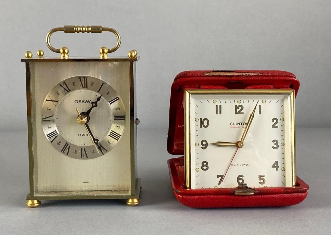 Group of 2 Vintage Clocks: In working condition, includes Clinton pocket travel clock and Osawa desk clock, largest measures 5 inches H x 3 inches W x 2 inches D