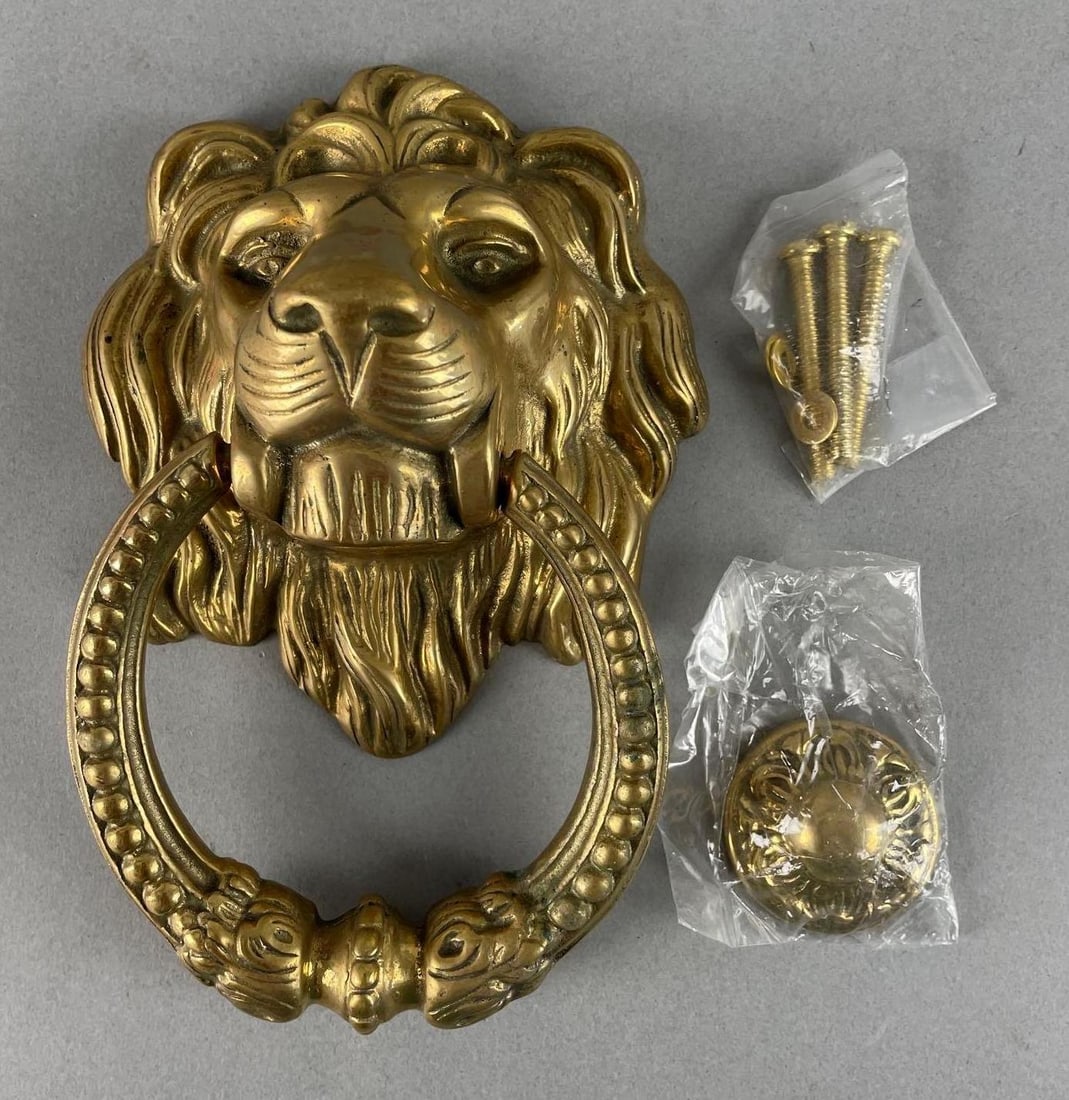 Brass Lion Head Door Knocker: Measures 8 1/2" x 5 1/2" x 3 1/4"