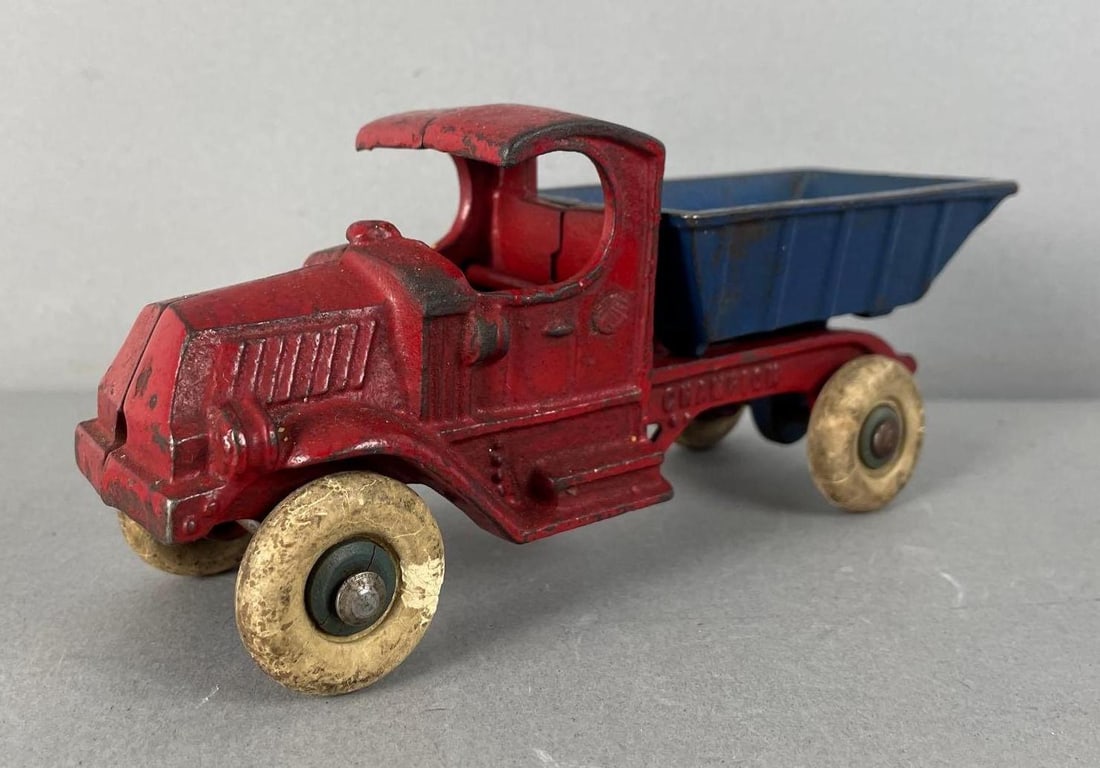 Vintage Champion Hardware Cast Iron C-Cab Dump Truck: Original wheels, measures 3" x 7" x 2 1/4"