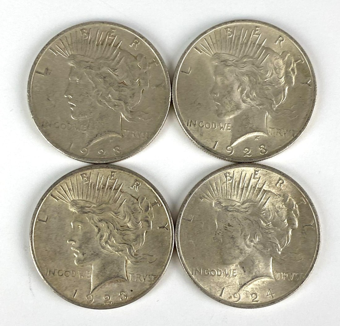 Group of 4 1920s Silver Peace Dollars (1 of 2)