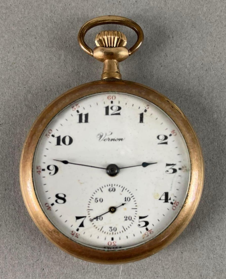 Vernon 7 Jewels Gold Tone Open Face Pocket Watch: Working condition, Illinois watch case co. Elgin, measures 2 1/4" x 1 3/4"