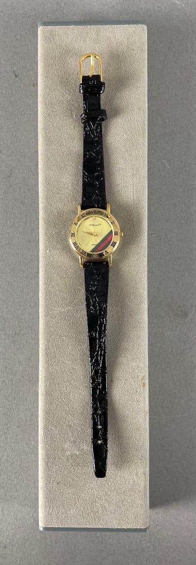Vintage St. Bernard Quartz Ladies Wristwatch: Gold tones, black leather band, measures 7 3/4"